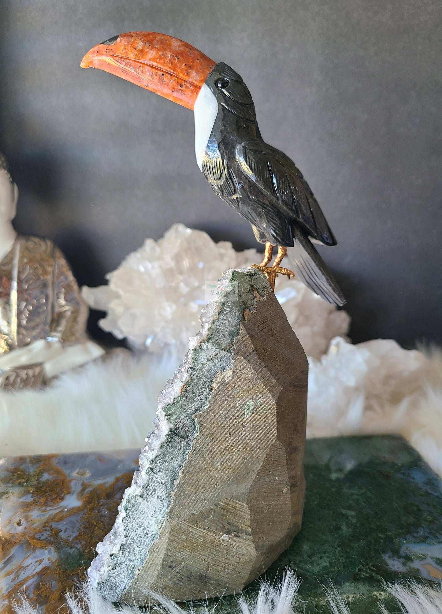 Toucan Carving on Amethyst Cut base