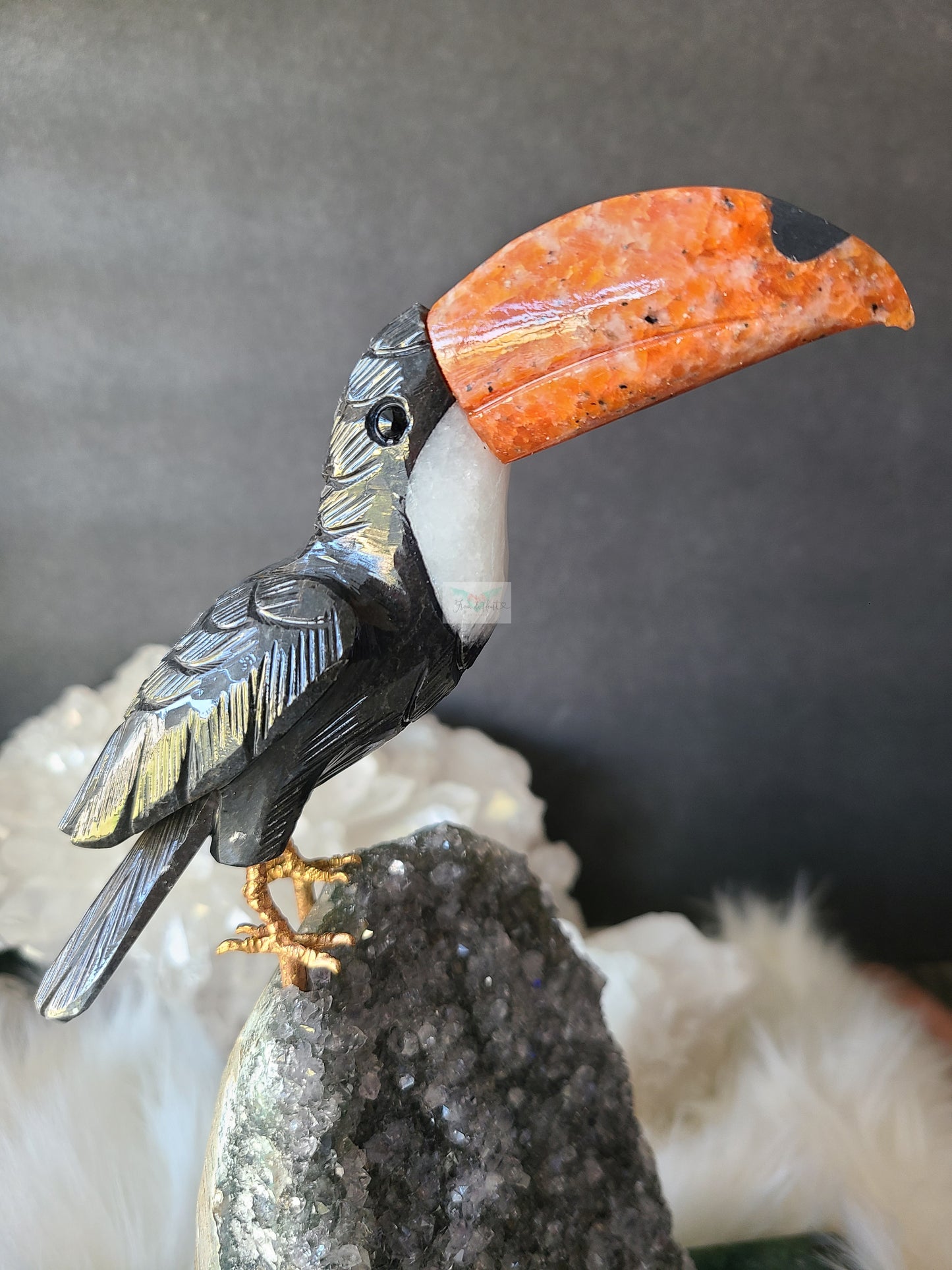 Toucan Carving on Amethyst Cut base