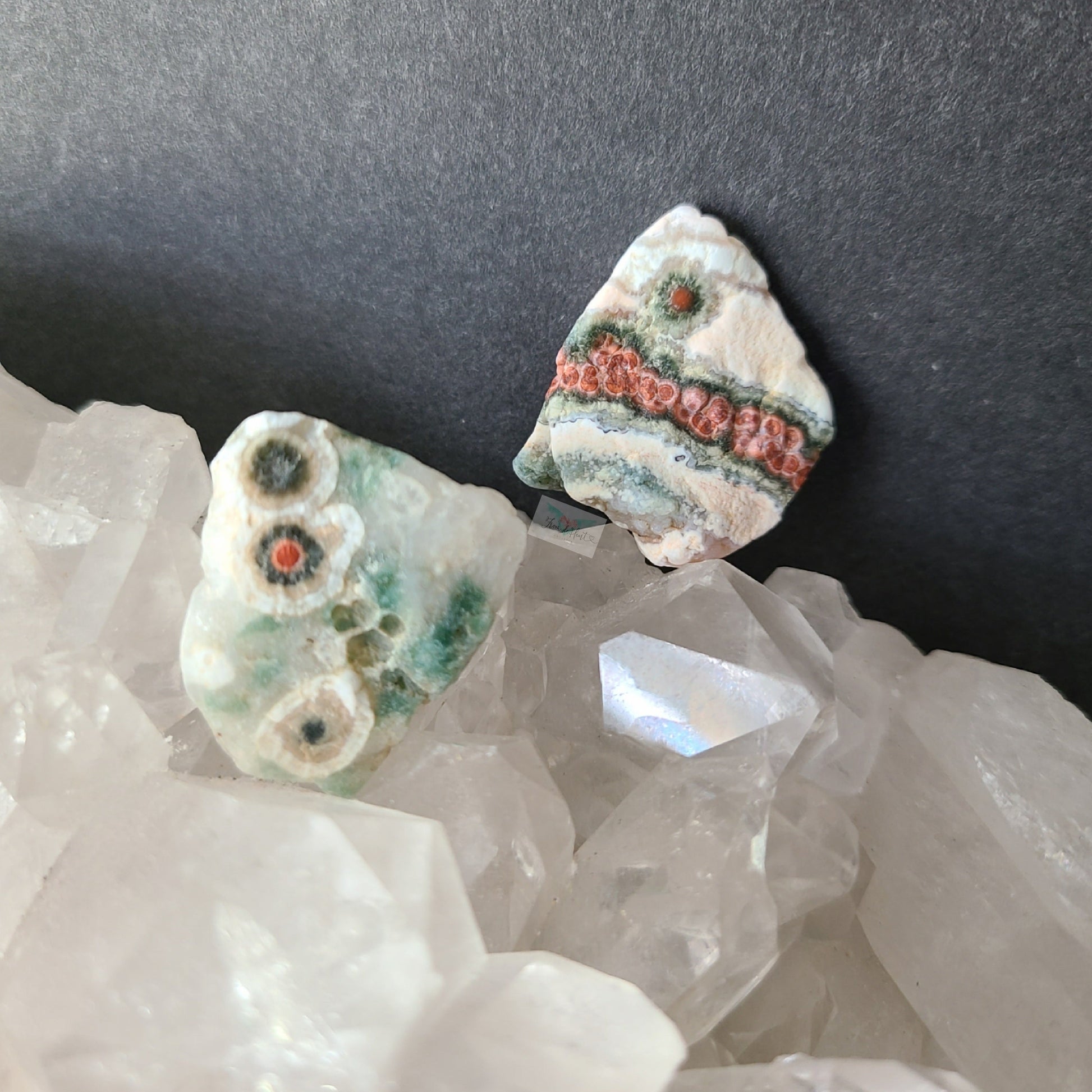 Two raw unpolished first vein ocean jasper pocket stones. Red orbs green and white banding on Quartz and Jasper